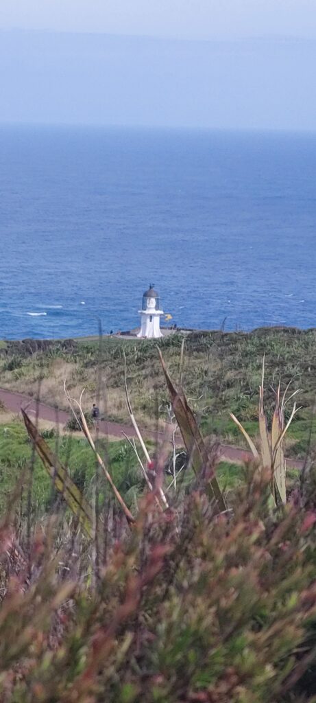 Cape Reinga lighthouse where the Tasman Sea and Pacific Ocean meet, sacred Māori site Te Rerenga Wairua